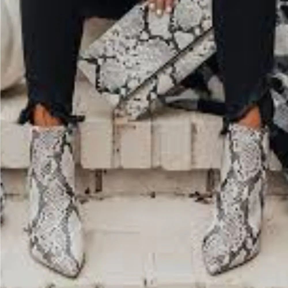 MARC FISHER POINTED TOE MFLEAVE SNAKE PRINT ZIP ANKLE BOOT